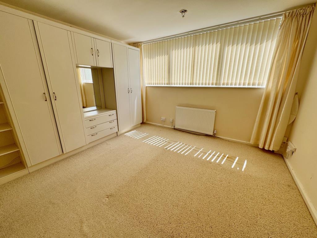 Lot: 113 - TWO-BEDROOM MAISONETTE FOR REDECORATION WITH GARAGE EN-BLOC - Bedroom 1